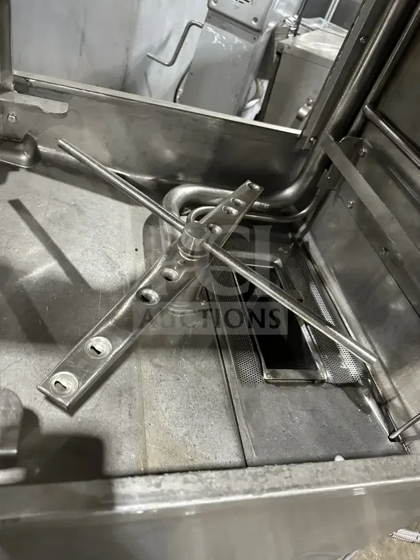Hobart AM15 commercial dishwasher, stainless steel, ventless, door-type, high-temp washing, electric-powered, on legs.