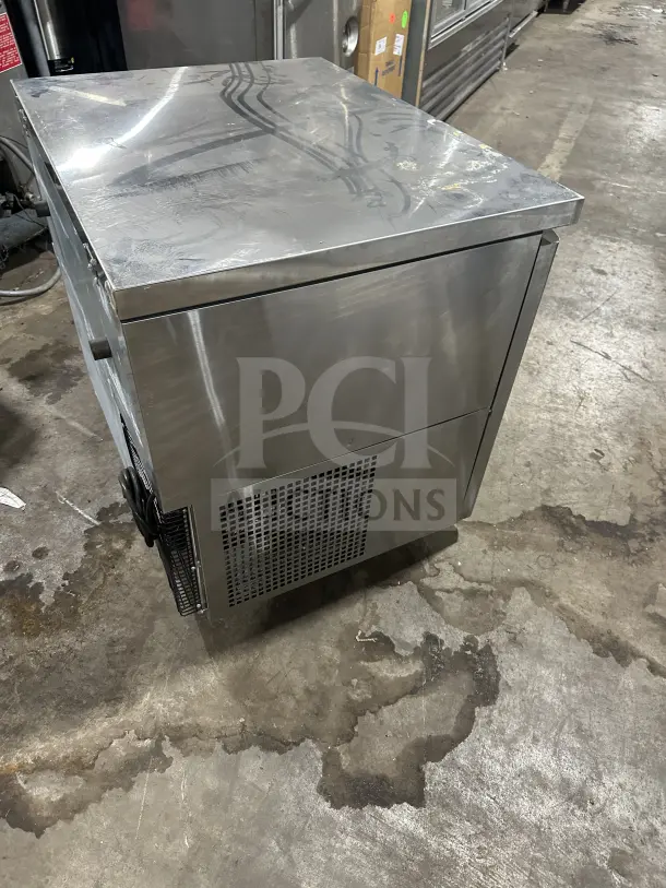 Turbo Air JUR-36 stainless steel undercounter refrigerator, 36", side compressor, poly coated rack, 115V, used condition.