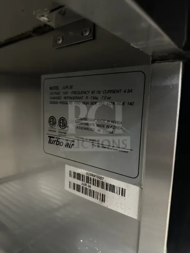 Turbo Air JUR-36 commercial refrigerator label, voltage 115V, 60Hz, R-134a refrigerant, serial number JU3R910007.