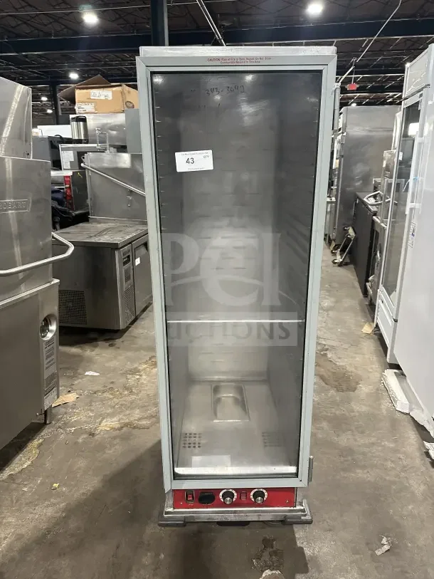 Avantco stainless steel heated holding cabinet, model 177HPI1836, with clear door, pan slides, casters, and 120V power.