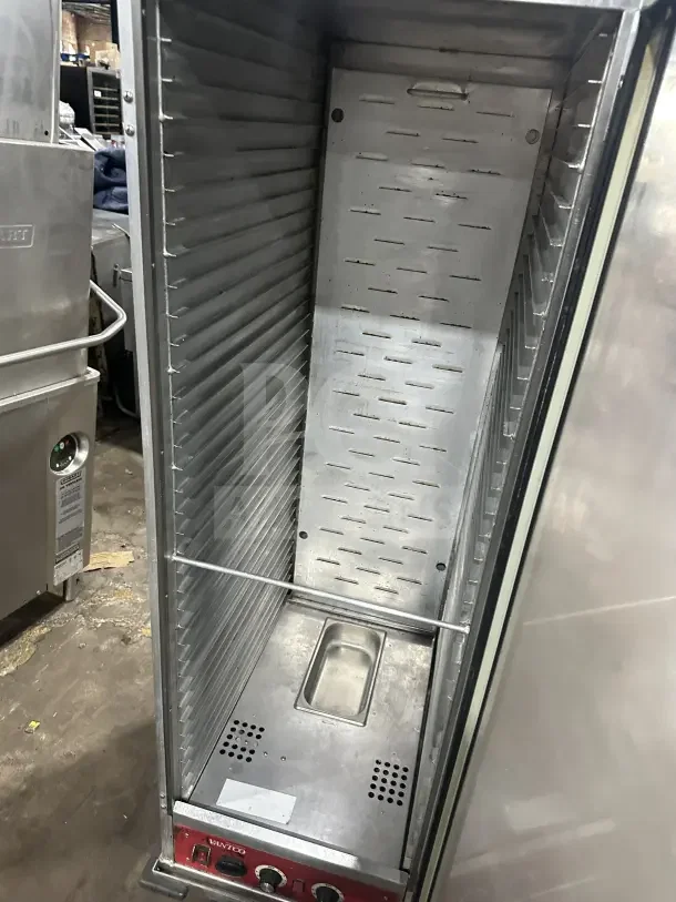 Avantco stainless steel heated holding cabinet, model 177HPI1836, with clear door, pan slides, 120V, on casters.