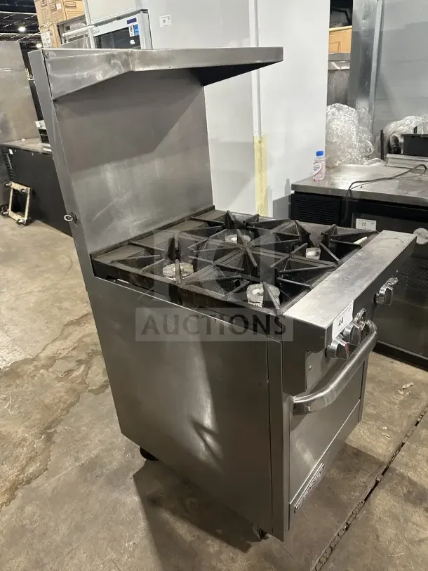 Southbend stainless steel 4-burner gas range/oven combo, Model S241E, with backsplash, shelf, and casters. Serial 19H17274.