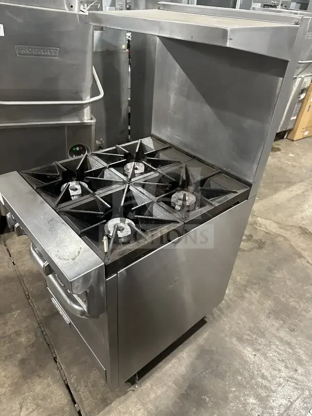 Southbend S241E stainless steel 4-burner range/oven, natural gas, with backsplash, salamander shelf, wired rack, on casters.
