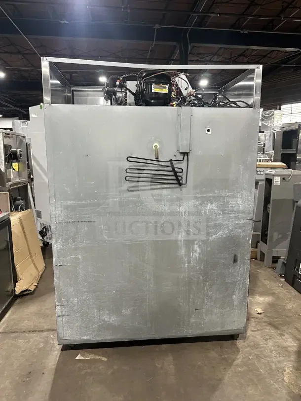 Hoshizaki CF2S-FS stainless steel 55" two-section reach-in upright freezer on casters, in used condition.