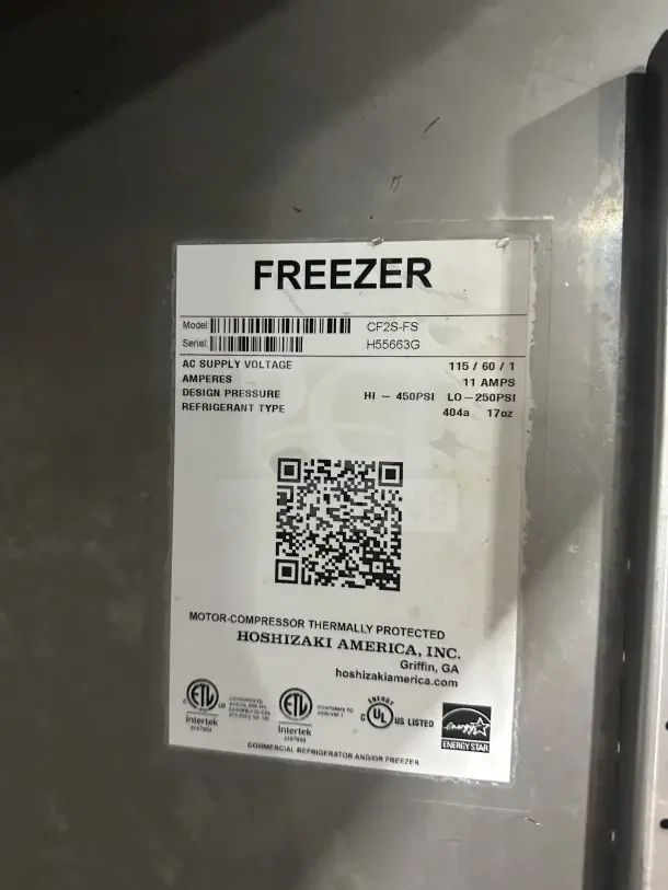 Hoshizaki CF2SFS 55" two-section stainless steel upright freezer, model CF2S-FS, SN: H55663G, on casters, 115V, 1 phase.