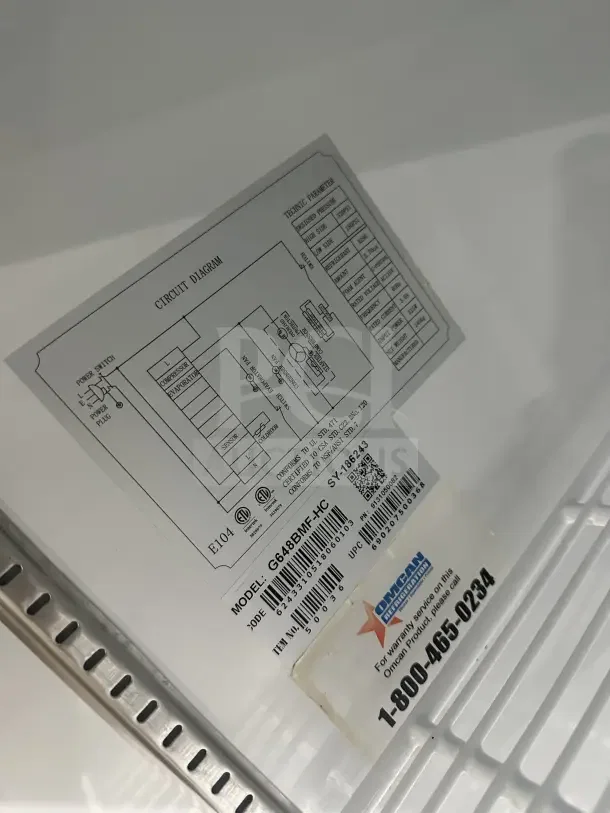 Omcan Commercial 28" Glass Door Refrigerator Merchandiser, Model G648BMF-HC, with poly-coated wire rack; tags with model info visible.