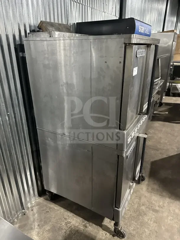 Blodgett stainless steel double convection oven, gas-powered, thermostatic controls, on casters, commercial use.