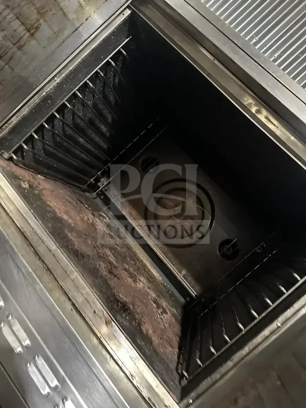 Blodgett stainless steel gas-powered double stacked convection oven, used, with thermostatic controls and casters, interior view.