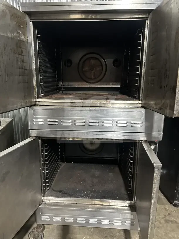 Blodgett stainless steel double stacked gas convection oven with thermostatic controls, on casters, used condition.