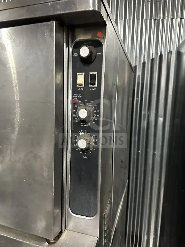 Blodgett commercial stainless steel double-stacked gas convection oven with thermostatic controls, on casters, in good condition.