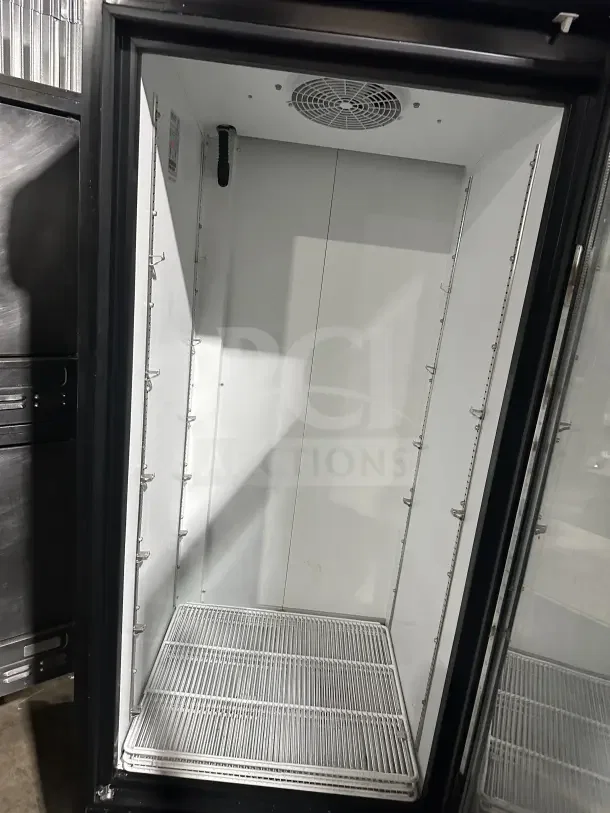 Ojeda Commercial 30" single glass swing door reach-in freezer merchandiser with poly-coated wire rack, Model FMH27.
