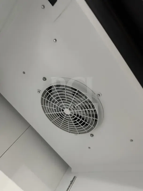 Ojeda FMH27 freezer fan interior view, showing white casing and metal grill. Model FMH-27, SN: 004025-30133-Z, 120V, 1 Phase.