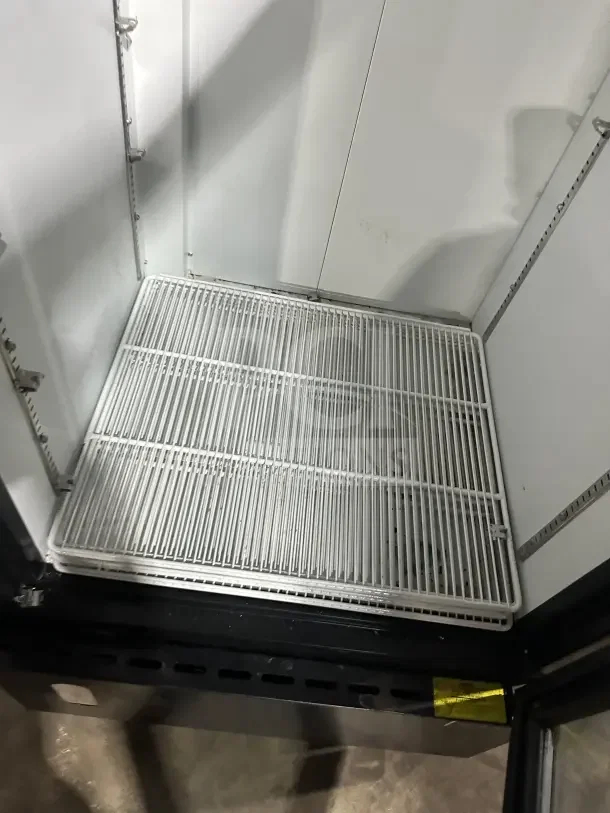 Ojeda FMH27 commercial freezer with single glass door, poly-coated wire rack, black finish. Model: FMH-27, SN: 004025-30133-Z.
