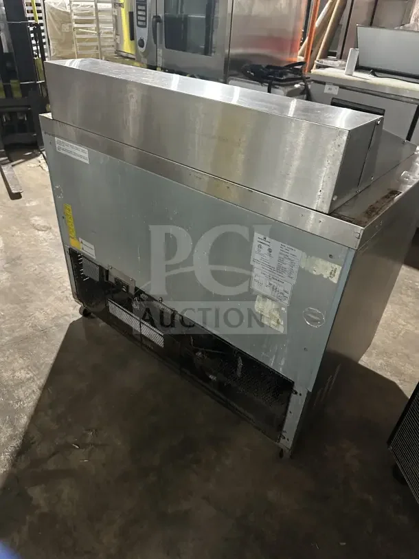 Kelvinator 2-Door Stainless Steel Prep Table, Model KCHMT418, on casters, visible labels, suitable for commercial use.