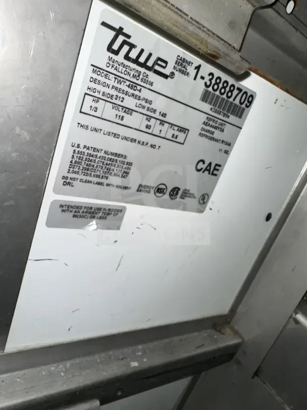 True TWT48D4 stainless steel worktop refrigerator, SN: 13888709, with 4 drawers, backsplash, on casters, 115V, 1 phase.