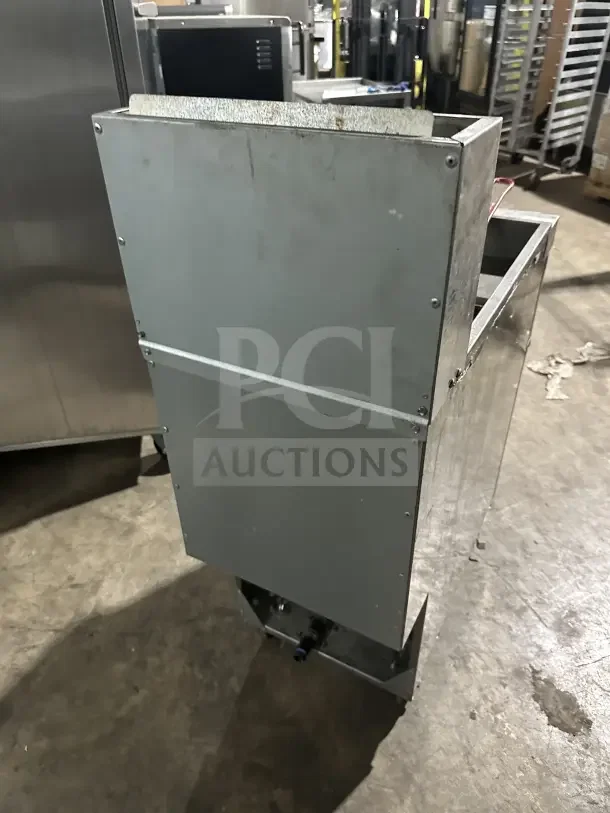 Connerton Commercial Stainless Steel 50 lb. Gas Floor Fryer, Model CSGF4ADT, with backsplash and basket hanger on casters.