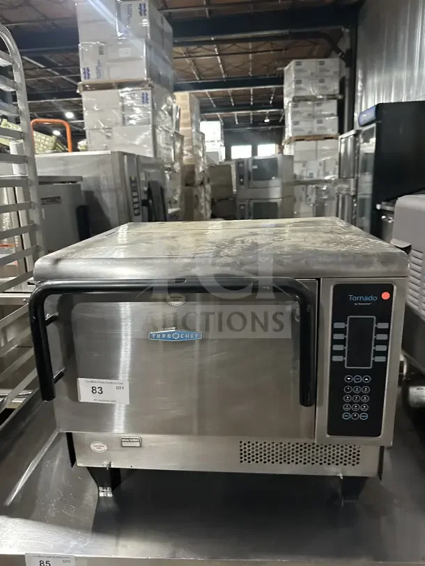 TurboChef Tornado Series stainless steel rapid cook oven with digital touch controls, on legs; visible wear.