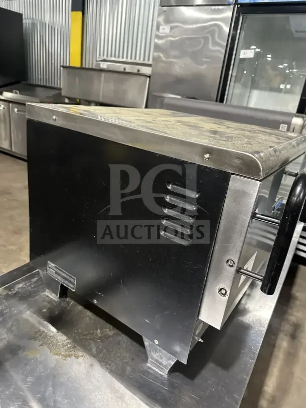 TurboChef Tornado Series stainless steel rapid cook oven with digital touch controls, electric-powered, on legs, used condition.