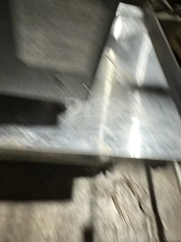 Blurry image of a TurboChef Tornado series commercial stainless steel rapid cook oven with digital touch controls.