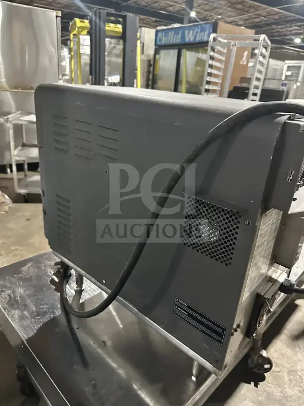 TurboChef Model NGO electric rapid cook oven, countertop design, digital controls, serial NGO014439, on legs, 208/240V, 1-phase.