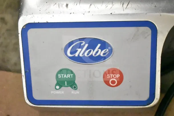 2021 Globe S13 Commercial Meat Slicer with blade sharpener, visible start/stop buttons, 110V, 1 phase.