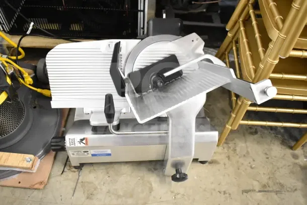 2021 Globe S13 commercial meat slicer with blade sharpener, 110V, 1-phase, excellent condition, visible safety and model labels.