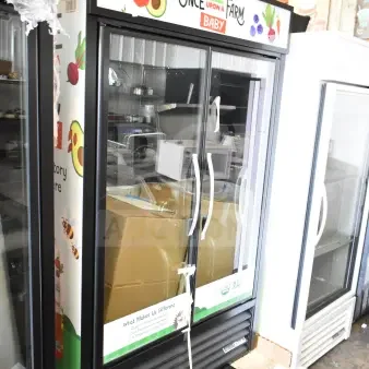 BRAND NEW SCRATCH AND DENT 2026 True TVM-48SL-HC Commercial 2 Door Reach-In Cooler, 115V, 1 Phase, graphics on top.