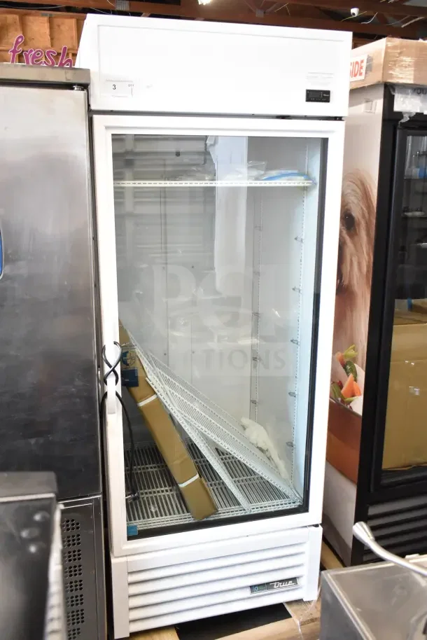 2021 True TSCI-600R-G-PH commercial single-door cooler, 115V, 1 phase, excellent condition with glass door and adjustable shelves.