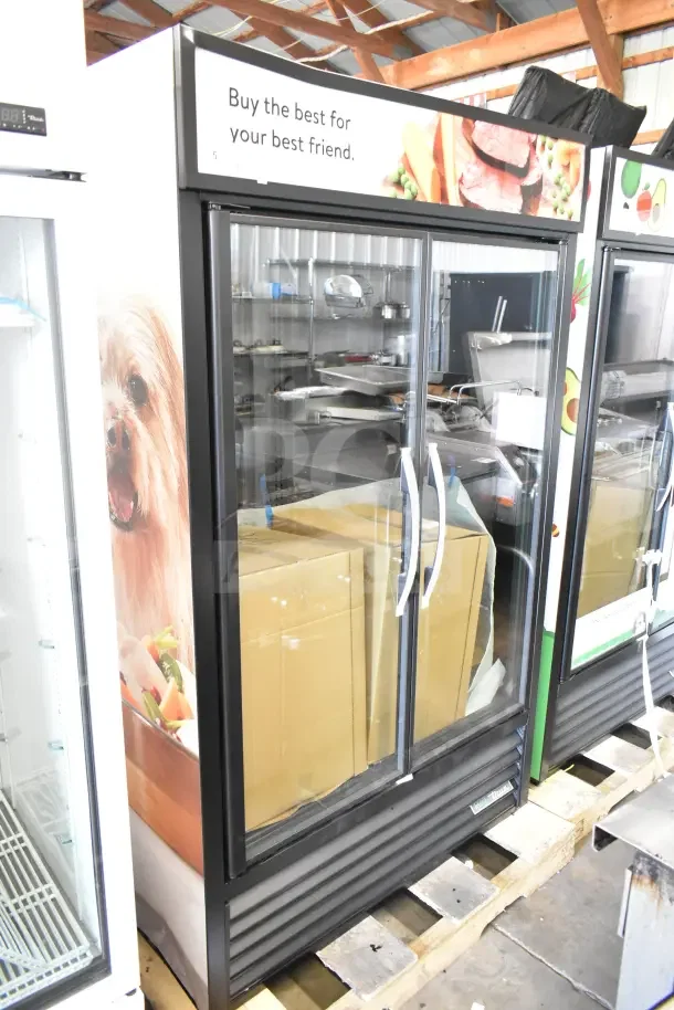 Brand new 2026 True TVM-48SL-HC commercial 2-door reach-in cooler, 115 volts, 1 phase. Visible scratches and dents.