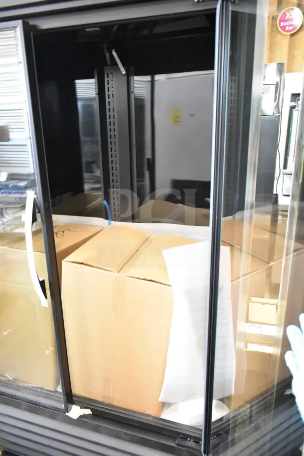 True TVM-48SL-HC commercial cooler merchandiser, brand new, scratch and dent condition, 2 glass doors, 115 volts.
