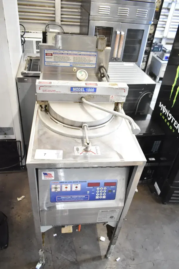Broaster 1800 commercial gas-powered pressure fryer, stainless steel, floor style, visible control panel, lightly used condition.
