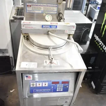Broaster 1800 commercial gas-powered pressure fryer, stainless steel, floor style, visible control panel, lightly used condition.