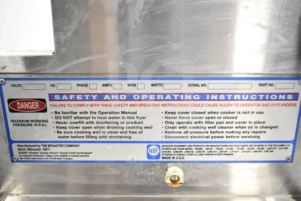 Broaster 1800 commercial floor gas pressure fryer with safety and operating instructions label, made in USA.