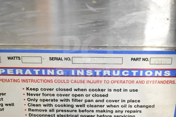 Broaster 1800 gas-powered pressure fryer with visible operating instructions, serial number SG81312410, and part number 85782.