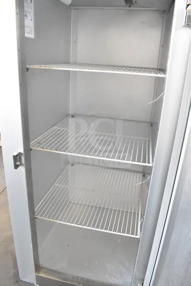 2020 Traulsen G12010 commercial single door cooler on casters, 115V, 1 phase; four wire shelves, clean interior.