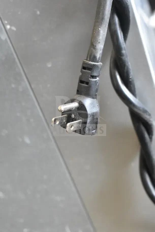 2020 Traulsen G12010 commercial reach-in cooler plug, showing standard three-prong connector. 115V, 1 phase.