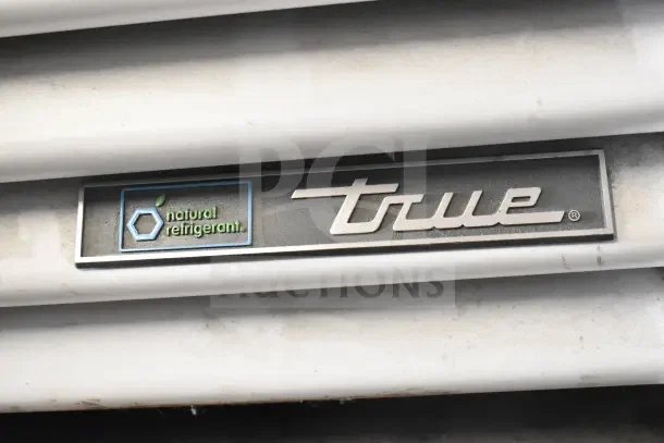 2021 True TSCI-600R-G-PH cooler label with "natural refrigerant" text, features single-door design, 115V, 1-phase.
