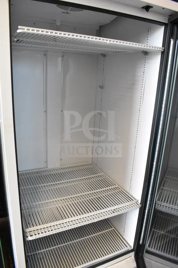 2021 True TSCI-600R-G-PH commercial cooler, single glass door, three wire shelves, excellent condition, 115V, 1 phase.