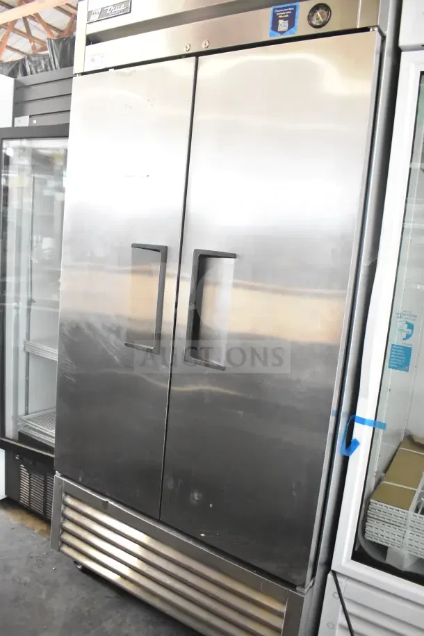 2016 True T-35 Commercial 2 Door Reach-In Cooler, stainless steel, on casters, 115V, 1 Phase. Good condition.