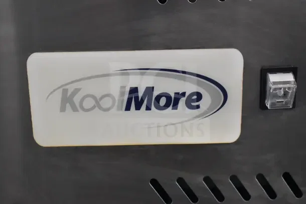 KoolMore 59 in. commercial refrigerated pizza prep station logo detail showing brand name and part of control panel.