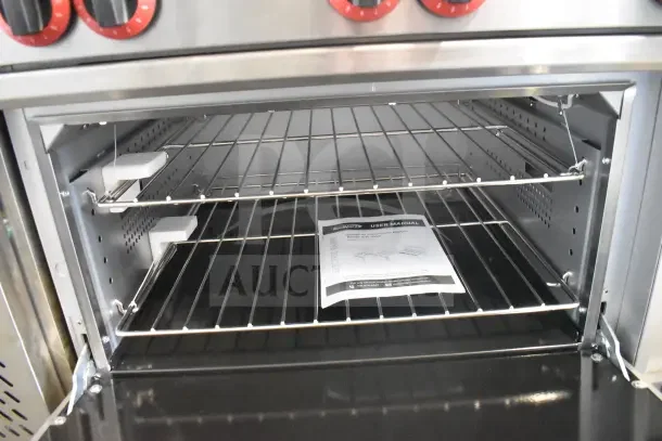 BRAND NEW KoolMore KM-CR36-E commercial range with 6 burners, 1 oven; includes user manual; slight scratch and dent condition.