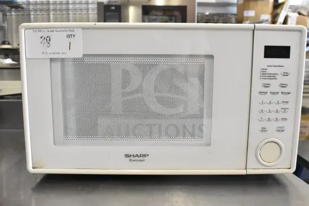 Sharp R-309YW Countertop Microwave Oven, 120V, 1 phase, features auto cook menu, digital display, visible wear on exterior.