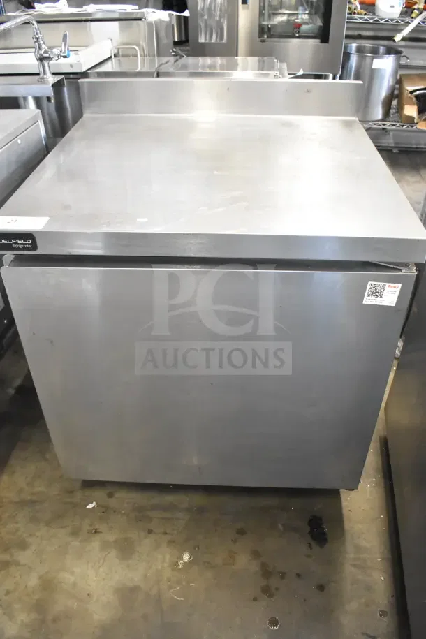2019 Delfield GUR32BP-S commercial work top cooler, stainless steel, on casters, single door, well-maintained condition.