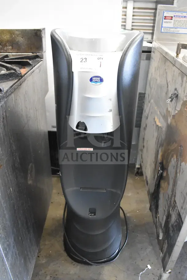 SOBP210ESNS Top Load Water Cooler, 115V, 1 Phase. Features Nestlé Waters branding, "CAUTION HOT" label visible. Used condition.