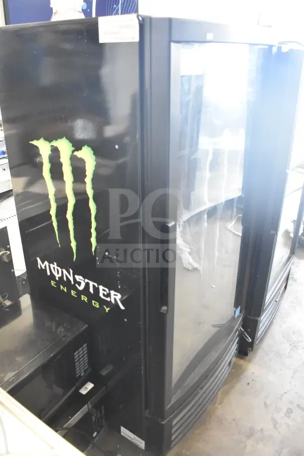 IDW GCG-10-F334B commercial single door cooler with Monster Energy branding. Black exterior, 115 volts, 1 phase.