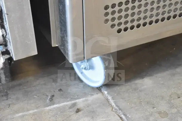 Desmon GBF-15+ETL stainless steel blast chiller shock freezer on commercial casters, showing sturdy wheels.