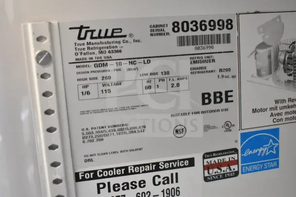 True GDM-10-HC-LD mini cooler merchandiser label showing model, 115 volts, 1 phase, refrigerant R290 info, and brand markings.