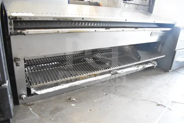 Southbend gas-powered cheese melter, stainless steel, showing visible wear. Ideal for commercial kitchens. Brand logo visible.