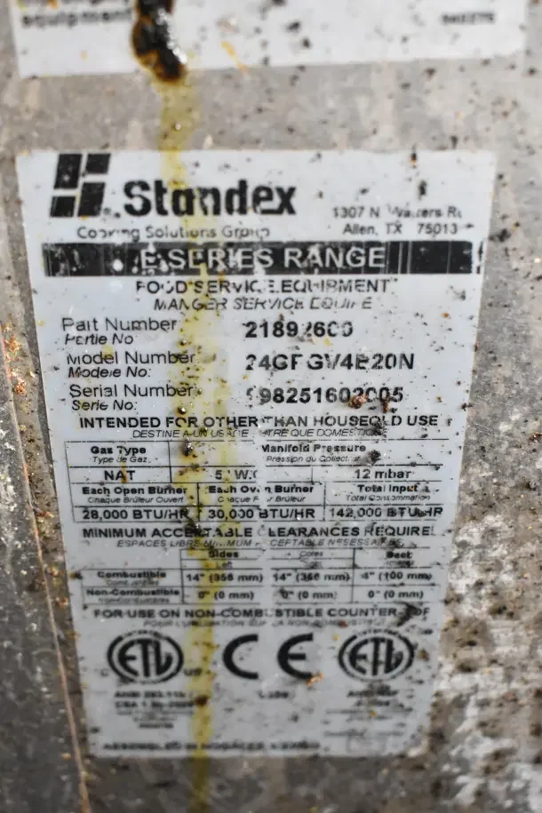 Standex 24GFGV4B20N label detailing model, part number, gas type, and usage. Slight wear visible.