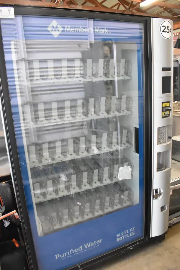 Crane 5800-4HC commercial bottled drink vending machine with bill acceptor, 115 volts, 1 phase, displaying 16.9 fl oz bottle slots.